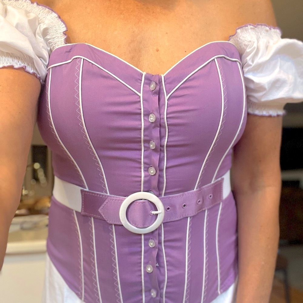 Bebe corset top. Beautifully made. Sleeves can be worn off the shoulders.